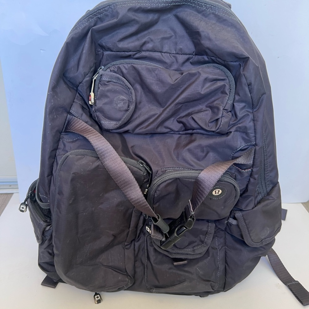 Lululemon dark gray/black multi pocket mens backpack…